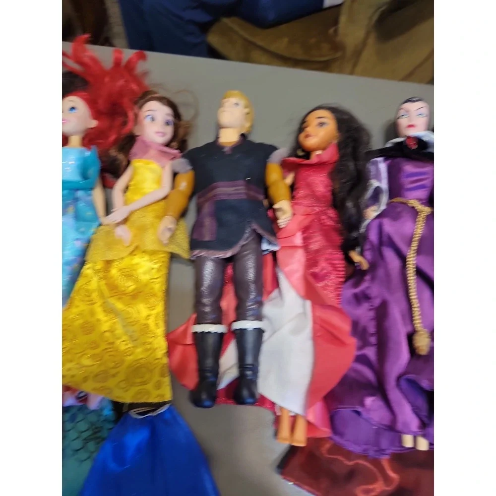 Disney Barbie dolls with extra dresses shoes etc... Mixed lot